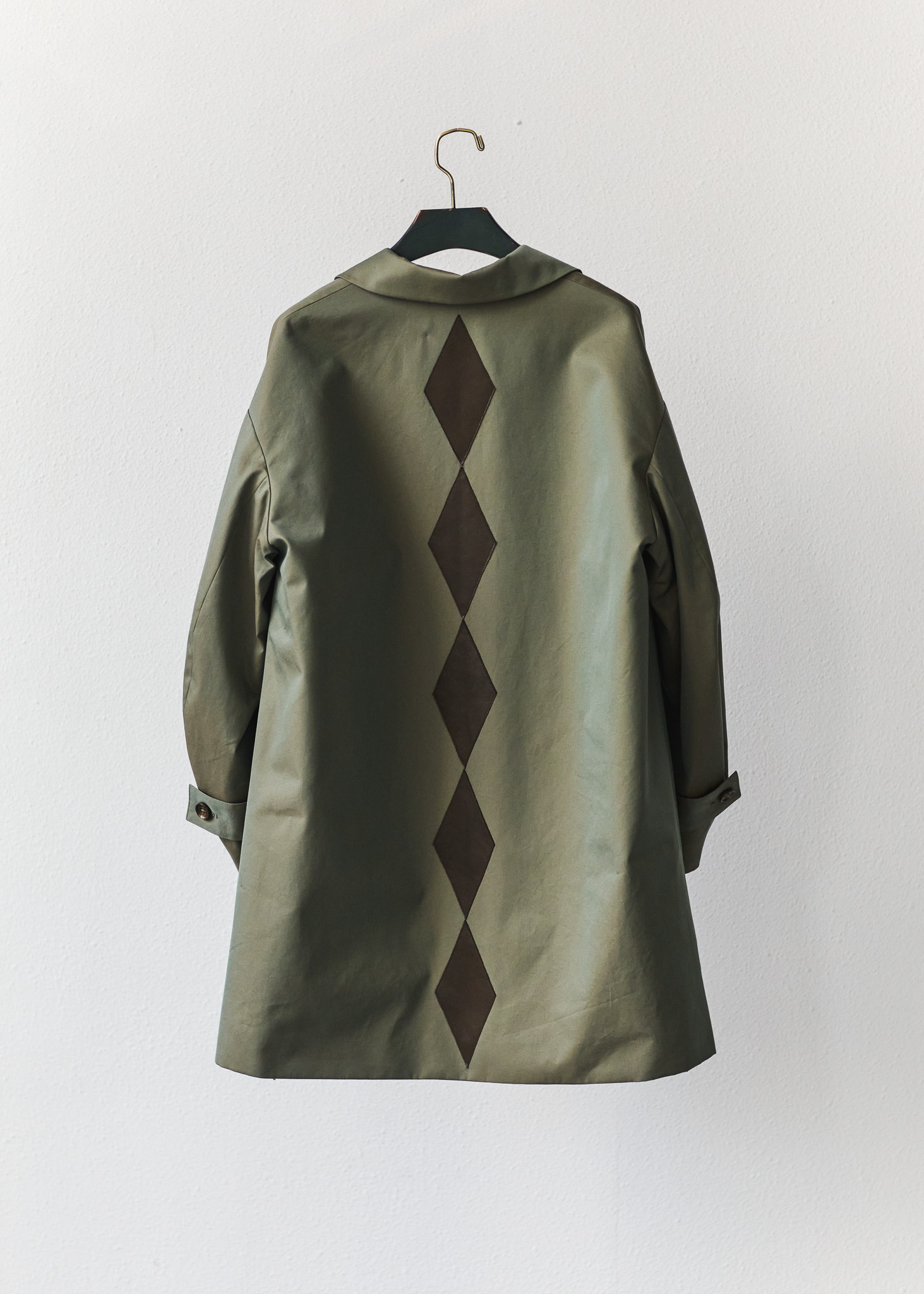 Between Acts FW26 HARLEQUIN SPINE COAT back view